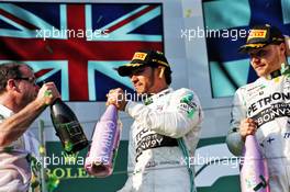 (L to R): Lewis Hamilton (GBR) Mercedes AMG F1 celebrates on the podium with race winner Valtteri Bottas (FIN) Mercedes AMG F1. 17.03.2019. Formula 1 World Championship, Rd 1, Australian Grand Prix, Albert Park, Melbourne, Australia, Race Day.
