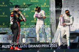 (L to R): Max Verstappen (NLD) Red Bull Racing celebrates on the podium with Lewis Hamilton (GBR) Mercedes AMG F1 and race winner Valtteri Bottas (FIN) Mercedes AMG F1. 17.03.2019. Formula 1 World Championship, Rd 1, Australian Grand Prix, Albert Park, Melbourne, Australia, Race Day.