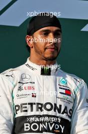 Lewis Hamilton (GBR) Mercedes AMG F1 on the podium. 17.03.2019. Formula 1 World Championship, Rd 1, Australian Grand Prix, Albert Park, Melbourne, Australia, Race Day.