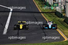 (L to R): Daniel Ricciardo (AUS) Renault F1 Team RS19 passes Robert Kubica (POL) Williams Racing FW42. 17.03.2019. Formula 1 World Championship, Rd 1, Australian Grand Prix, Albert Park, Melbourne, Australia, Race Day.