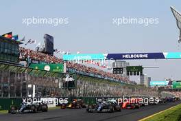 (L to R): Valtteri Bottas (FIN) Mercedes AMG F1 W10 and Lewis Hamilton (GBR) Mercedes AMG F1 W10 at the start of the race. 17.03.2019. Formula 1 World Championship, Rd 1, Australian Grand Prix, Albert Park, Melbourne, Australia, Race Day.