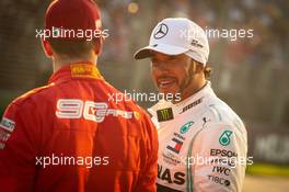 Lewis Hamilton (GBR) Mercedes AMG F1 celebrates his pole position in qualifying parc ferme with Sebastian Vettel (GER) Ferrari. 16.03.2019. Formula 1 World Championship, Rd 1, Australian Grand Prix, Albert Park, Melbourne, Australia, Qualifying Day.