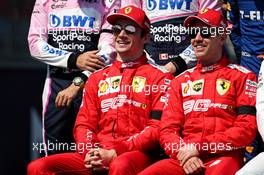 (L to R): Charles Leclerc (MON) Ferrari and Sebastian Vettel (GER) Ferrari at the start of season group photograph. 17.03.2019. Formula 1 World Championship, Rd 1, Australian Grand Prix, Albert Park, Melbourne, Australia, Race Day.