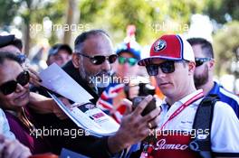 Kimi Raikkonen (FIN) Alfa Romeo Racing with fans. 14.03.2019. Formula 1 World Championship, Rd 1, Australian Grand Prix, Albert Park, Melbourne, Australia, Preparation Day.
