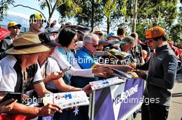 Carlos Sainz Jr (ESP) McLaren signs autographs for the fans. 14.03.2019. Formula 1 World Championship, Rd 1, Australian Grand Prix, Albert Park, Melbourne, Australia, Preparation Day.