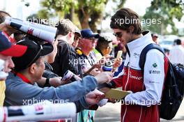 Antonio Giovinazzi (ITA) Alfa Romeo Racing signs autographs for the fans. 14.03.2019. Formula 1 World Championship, Rd 1, Australian Grand Prix, Albert Park, Melbourne, Australia, Preparation Day.