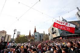 A flag for Robert Kubica (POL) Williams Racing among fans at the F1 Season Launch in Federation Square. 13.03.2019. Formula 1 World Championship, Rd 1, Australian Grand Prix, Albert Park, Melbourne, Australia, Preparation Day.