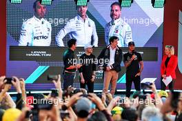 (L to R): Mark Webber (AUS) Channel 4 Presenter; Valtteri Bottas (FIN) Mercedes AMG F1; Toto Wolff (GER) Mercedes AMG F1 Shareholder and Executive Director; and Lewis Hamilton (GBR) Mercedes AMG F1, at the F1 Season Launch in Federation Square. 13.03.2019. Formula 1 World Championship, Rd 1, Australian Grand Prix, Albert Park, Melbourne, Australia, Preparation Day.