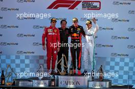 The podium (L to R): Charles Leclerc (MON) Ferrari, second; Toyoharu Tanabe (JPN) Honda Racing F1 Technical Director; Max Verstappen (NLD) Red Bull Racing, race winner; Valtteri Bottas (FIN) Mercedes AMG F1, third. 30.06.2019 Formula 1 World Championship, Rd 9, Austrian Grand Prix, Spielberg, Austria, Race Day.