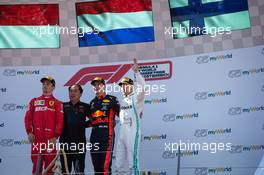 The podium (L to R): Charles Leclerc (MON) Ferrari, second; Toyoharu Tanabe (JPN) Honda Racing F1 Technical Director; Max Verstappen (NLD) Red Bull Racing, race winner; Valtteri Bottas (FIN) Mercedes AMG F1, third. 30.06.2019 Formula 1 World Championship, Rd 9, Austrian Grand Prix, Spielberg, Austria, Race Day.