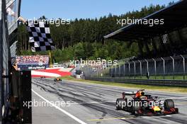 Race winner Max Verstappen (NLD) Red Bull Racing RB15 takes the chequered flag at the end of the race. 30.06.2019 Formula 1 World Championship, Rd 9, Austrian Grand Prix, Spielberg, Austria, Race Day.