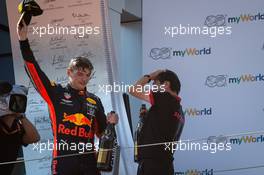 Race winner Max Verstappen (NLD) Red Bull Racing celebrates on the podium with Toyoharu Tanabe (JPN) Honda Racing F1 Technical Director. 30.06.2019 Formula 1 World Championship, Rd 9, Austrian Grand Prix, Spielberg, Austria, Race Day.