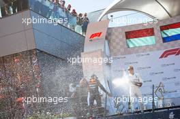 Valtteri Bottas (FIN) Mercedes AMG F1 celebrates his third position on the podium. 30.06.2019 Formula 1 World Championship, Rd 9, Austrian Grand Prix, Spielberg, Austria, Race Day.