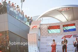 The podium (L to R): Charles Leclerc (MON) Ferrari, second; Max Verstappen (NLD) Red Bull Racing, race winner; Valtteri Bottas (FIN) Mercedes AMG F1, third. 30.06.2019 Formula 1 World Championship, Rd 9, Austrian Grand Prix, Spielberg, Austria, Race Day.