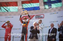The podium (L to R): Charles Leclerc (MON) Ferrari, second; Max Verstappen (NLD) Red Bull Racing, race winner; Valtteri Bottas (FIN) Mercedes AMG F1, third. 30.06.2019 Formula 1 World Championship, Rd 9, Austrian Grand Prix, Spielberg, Austria, Race Day.