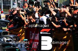 Race winner Max Verstappen (NLD) Red Bull Racing celebrates with the team in parc ferme. 30.06.2019 Formula 1 World Championship, Rd 9, Austrian Grand Prix, Spielberg, Austria, Race Day.