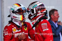 (L to R): Sebastian Vettel (GER) Ferrari with race winner and team mate Charles Leclerc (MON) Ferrari in parc ferme. 30.06.2019 Formula 1 World Championship, Rd 9, Austrian Grand Prix, Spielberg, Austria, Race Day.