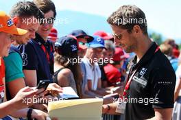 Romain Grosjean (FRA) Haas F1 Team signs autographs for the fans. 29.06.2019. Formula 1 World Championship, Rd 9, Austrian Grand Prix, Spielberg, Austria, Qualifying Day.