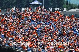 Circuit atmosphere - fans in the grandstand. 29.06.2019. Formula 1 World Championship, Rd 9, Austrian Grand Prix, Spielberg, Austria, Qualifying Day.