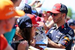 Pierre Gasly (FRA) Red Bull Racing signs autographs for the fans. 29.06.2019. Formula 1 World Championship, Rd 9, Austrian Grand Prix, Spielberg, Austria, Qualifying Day.