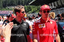 (L to R): Romain Grosjean (FRA) Haas F1 Team and Charles Leclerc (MON) Ferrari on the drivers parade. 30.06.2019 Formula 1 World Championship, Rd 9, Austrian Grand Prix, Spielberg, Austria, Race Day.