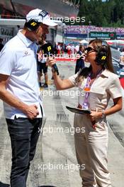 Sabine Sassine, TV Presenter, with Alex Wurz (AUT). 30.06.2019 Formula 1 World Championship, Rd 9, Austrian Grand Prix, Spielberg, Austria, Race Day.