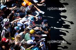 Pierre Gasly (FRA) Red Bull Racing RB15 signs autographs for the fans. 30.06.2019 Formula 1 World Championship, Rd 9, Austrian Grand Prix, Spielberg, Austria, Race Day.