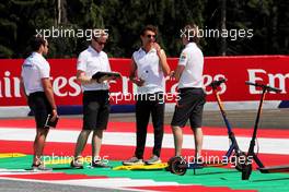 Lando Norris (GBR) McLaren walks the circuit with the team. 27.06.2019. Formula 1 World Championship, Rd 9, Austrian Grand Prix, Spielberg, Austria, Preparation Day.