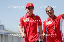 Charles Leclerc (MON) Ferrari walks the circuit with Marc Gene (ESP) Ferrari Test Driver. 27.06.2019. Formula 1 World Championship, Rd 9, Austrian Grand Prix, Spielberg, Austria, Preparation Day.