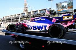 The Scuderia Toro Rosso STR14 of Lance Stroll (CDN) Racing Point F1 Team is recovered back to the pits on the back of a truck after he crashed in the second practice session. 26.04.2019. Formula 1 World Championship, Rd 4, Azerbaijan Grand Prix, Baku Street Circuit, Azerbaijan, Practice Day.