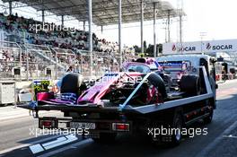 The Scuderia Toro Rosso STR14 of Lance Stroll (CDN) Racing Point F1 Team is recovered back to the pits on the back of a truck after he crashed in the second practice session. 26.04.2019. Formula 1 World Championship, Rd 4, Azerbaijan Grand Prix, Baku Street Circuit, Azerbaijan, Practice Day.