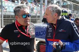 Franz Tost (AUT) Scuderia Toro Rosso Team Principal with Toyoharu Tanabe (JPN) Honda F1 Technical Director on the grid. 28.04.2019. Formula 1 World Championship, Rd 4, Azerbaijan Grand Prix, Baku Street Circuit, Azerbaijan, Race Day.