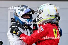 (L to R): Race winner Valtteri Bottas (FIN) Mercedes AMG F1 celebrates with third placed Sebastian Vettel (GER) Ferrari in parc ferme. 28.04.2019. Formula 1 World Championship, Rd 4, Azerbaijan Grand Prix, Baku Street Circuit, Azerbaijan, Race Day.