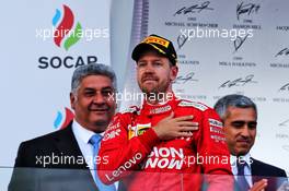 Sebastian Vettel (GER) Ferrari celebrates his third position on the podium. 28.04.2019. Formula 1 World Championship, Rd 4, Azerbaijan Grand Prix, Baku Street Circuit, Azerbaijan, Race Day.