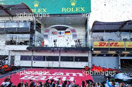 (L to R): Lewis Hamilton (GBR) Mercedes AMG F1 celebrates his second position on the podium with third placed Sebastian Vettel (GER) Ferrari and race winner Valtteri Bottas (FIN) Mercedes AMG F1. 28.04.2019. Formula 1 World Championship, Rd 4, Azerbaijan Grand Prix, Baku Street Circuit, Azerbaijan, Race Day.