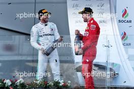 (L to R): lgp celebrates his second position on the podium with third placed Sebastian Vettel (GER) Ferrari. 28.04.2019. Formula 1 World Championship, Rd 4, Azerbaijan Grand Prix, Baku Street Circuit, Azerbaijan, Race Day.