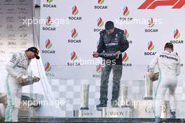 (L to R): Lewis Hamilton (GBR) Mercedes AMG F1 celebrates his second position on the podium with race winner Valtteri Bottas (FIN) Mercedes AMG F1. 28.04.2019. Formula 1 World Championship, Rd 4, Azerbaijan Grand Prix, Baku Street Circuit, Azerbaijan, Race Day.