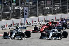 (L to R): Valtteri Bottas (FIN) Mercedes AMG F1 W10 and Lewis Hamilton (GBR) Mercedes AMG F1 W10 lead at the start of the race. 28.04.2019. Formula 1 World Championship, Rd 4, Azerbaijan Grand Prix, Baku Street Circuit, Azerbaijan, Race Day.