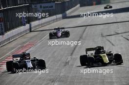 Kimi Raikkonen (FIN) Alfa Romeo Racing C38 and Daniel Ricciardo (AUS) Renault F1 Team RS19 battle for position. 28.04.2019. Formula 1 World Championship, Rd 4, Azerbaijan Grand Prix, Baku Street Circuit, Azerbaijan, Race Day.
