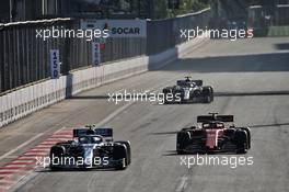 Valtteri Bottas (FIN) Mercedes AMG F1 W10 passes Charles Leclerc (MON) Ferrari SF90. 28.04.2019. Formula 1 World Championship, Rd 4, Azerbaijan Grand Prix, Baku Street Circuit, Azerbaijan, Race Day.