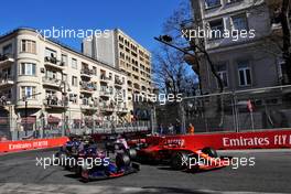 Alexander Albon (THA) Scuderia Toro Rosso STR14 and Charles Leclerc (MON) Ferrari SF90 at the start of the race. 28.04.2019. Formula 1 World Championship, Rd 4, Azerbaijan Grand Prix, Baku Street Circuit, Azerbaijan, Race Day.