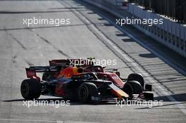 Pierre Gasly (FRA) Red Bull Racing RB15 and Charles Leclerc (MON) Ferrari SF90 battle for position. 28.04.2019. Formula 1 World Championship, Rd 4, Azerbaijan Grand Prix, Baku Street Circuit, Azerbaijan, Race Day.