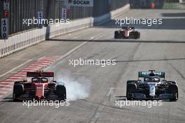 Charles Leclerc (MON) Ferrari SF90 and Lewis Hamilton (GBR) Mercedes AMG F1 W10 battle for position. 28.04.2019. Formula 1 World Championship, Rd 4, Azerbaijan Grand Prix, Baku Street Circuit, Azerbaijan, Race Day.