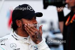 Lewis Hamilton (GBR) Mercedes AMG F1 in qualifying parc ferme - new tattoo on hand. 27.04.2019. Formula 1 World Championship, Rd 4, Azerbaijan Grand Prix, Baku Street Circuit, Azerbaijan, Qualifying Day.