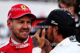 Lewis Hamilton (GBR) Mercedes AMG F1 with Sebastian Vettel (GER) Ferrari in qualifying parc ferme - new tattoo on hand. 27.04.2019. Formula 1 World Championship, Rd 4, Azerbaijan Grand Prix, Baku Street Circuit, Azerbaijan, Qualifying Day.