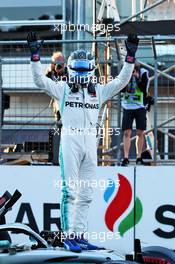 Valtteri Bottas (FIN) Mercedes AMG F1 W10 celebrates his pole position in qualifying parc ferme. 27.04.2019. Formula 1 World Championship, Rd 4, Azerbaijan Grand Prix, Baku Street Circuit, Azerbaijan, Qualifying Day.