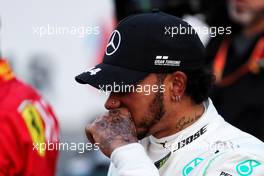 Lewis Hamilton (GBR) Mercedes AMG F1 in qualifying parc ferme - new tattoo on hand. 27.04.2019. Formula 1 World Championship, Rd 4, Azerbaijan Grand Prix, Baku Street Circuit, Azerbaijan, Qualifying Day.