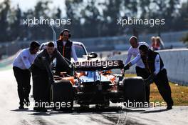 Carlos Sainz Jr (ESP) McLaren MCL34 stopped at the end of the pit lane. 18.02.2019. Formula One Testing, Day One, Barcelona, Spain. Monday.