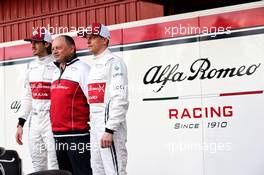(L to R): Antonio Giovinazzi (ITA) Alfa Romeo Racing with Frederic Vasseur (FRA) Alfa Romeo Racing Team Principal and Kimi Raikkonen (FIN) Alfa Romeo Racing. 18.02.2019. Formula One Testing, Day One, Barcelona, Spain. Monday.