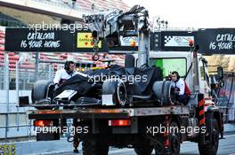 The Alfa Romeo Racing C38 of Kimi Raikkonen (FIN) Alfa Romeo Racing is recovered back to the pits on the back of a truck. 18.02.2019. Formula One Testing, Day One, Barcelona, Spain. Monday.